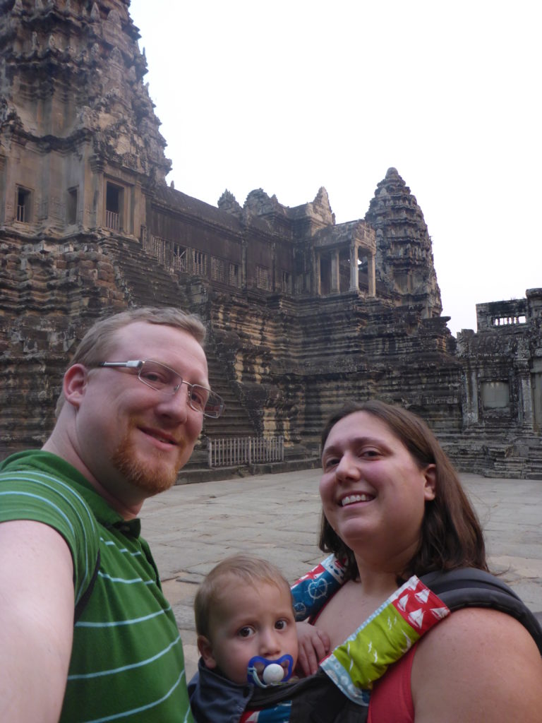Family selfie inside of Angkor wat with kids
