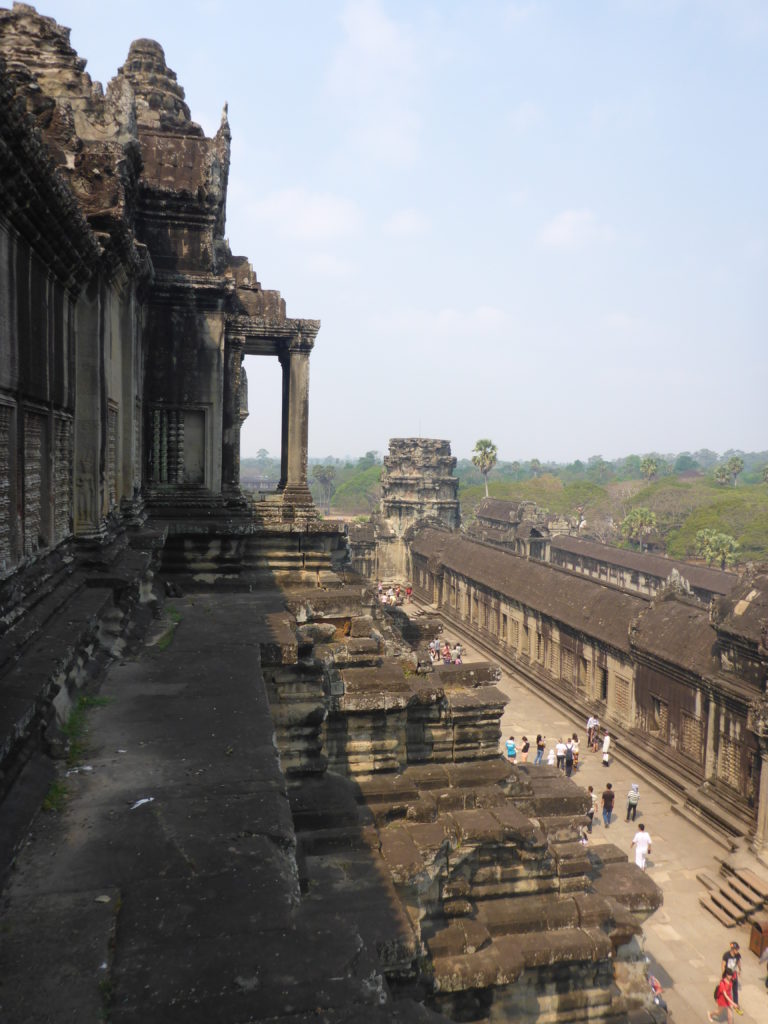 Atop one of the temples at angkor wat with kids