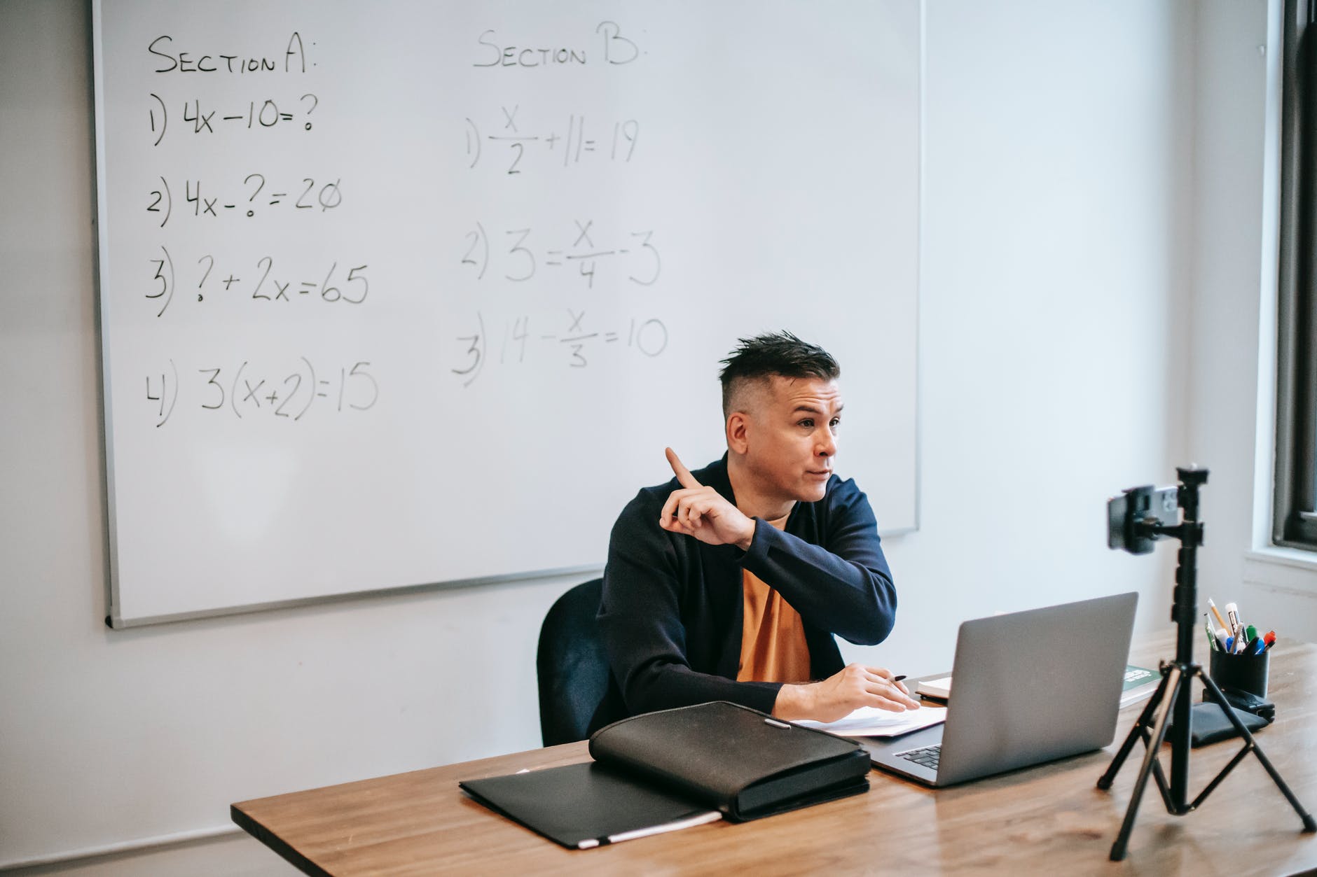 photo of man discussing via smartphone private online homeschool for kids