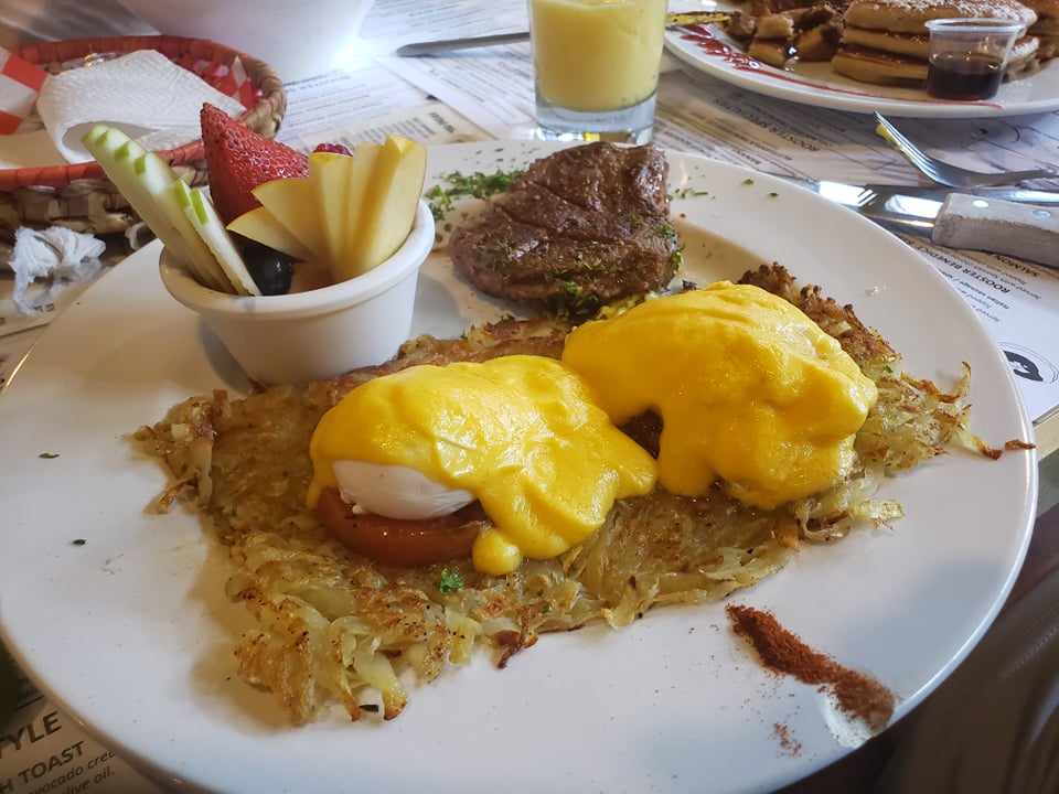 Eggs benedict at Rooster, one of the best breakfast places in isla mujeres