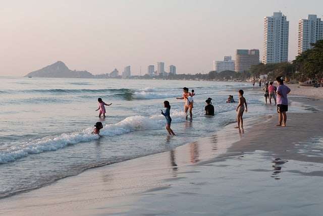 Sunset on the beach in hua hin with kids