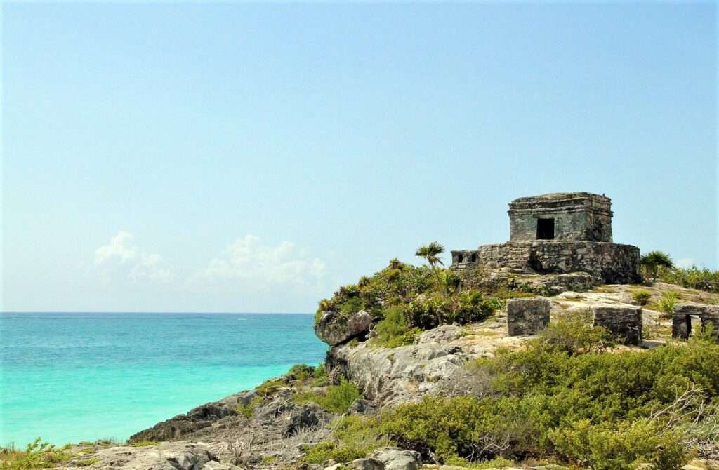 Visiting the oceanfront ruins in Tulum with kids are a fun adventure.