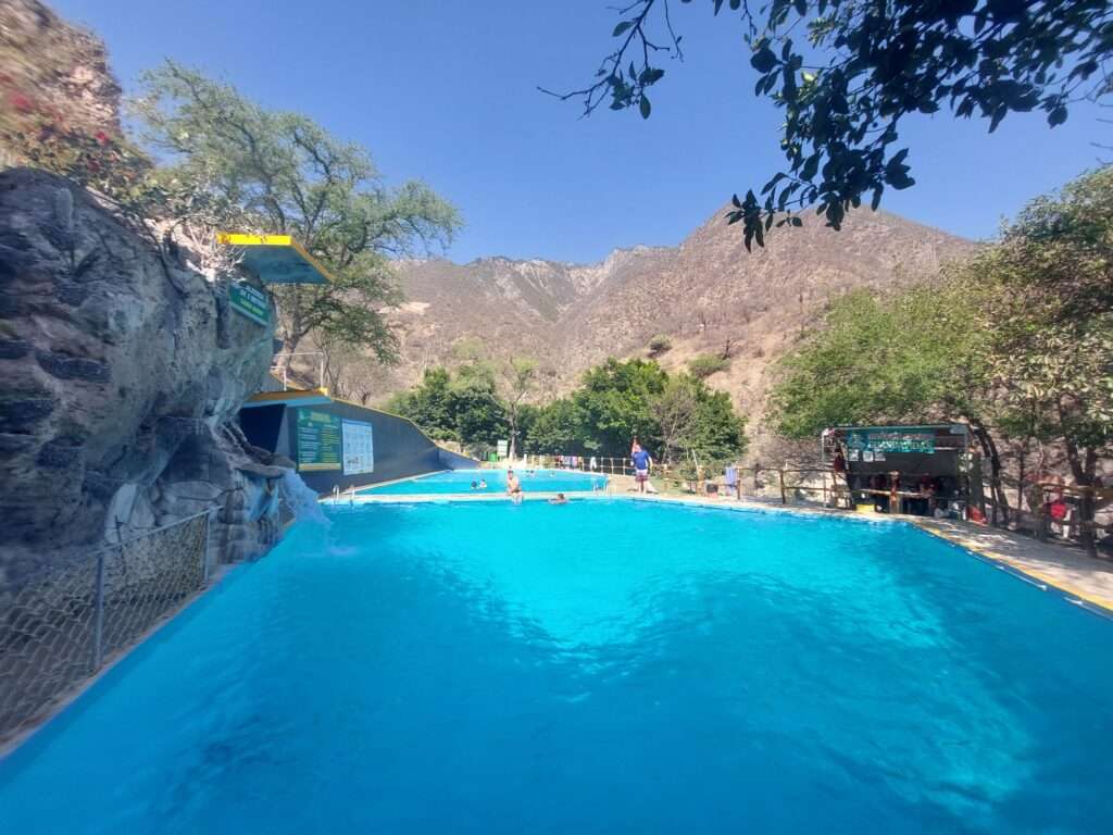 2 rectangular pools near HotelLa Gruta at Grutas Tolantongo Hot Springs. Photo was taken during the day.