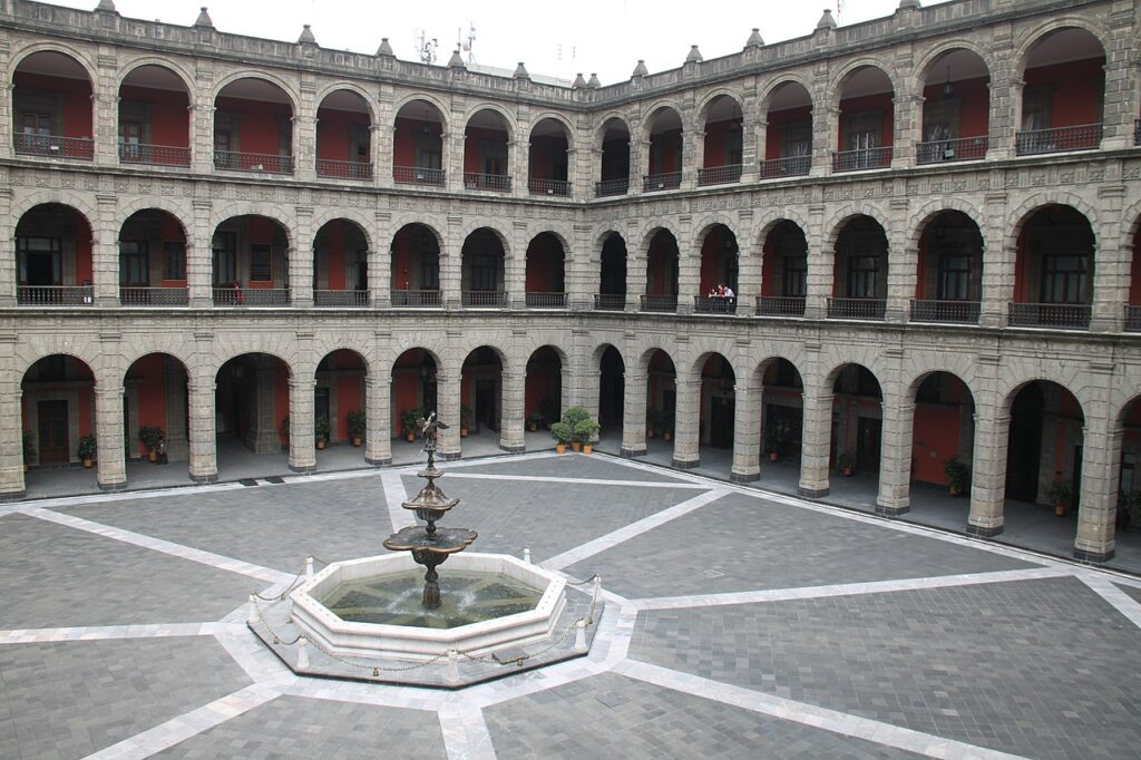 Main courtyard with fountain of the National Palace in the Mexico City Zocalo. Photo was taken from a second floor alcove.