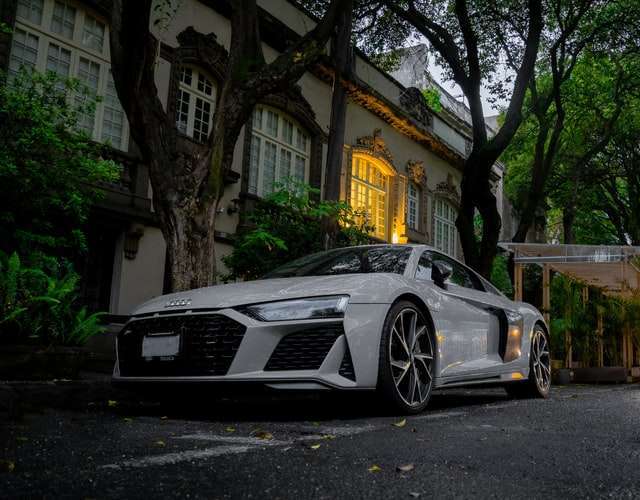 White Audi coupe parked on the street in Roma Norte.