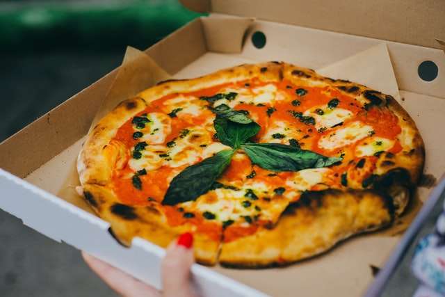 Eating italian style pizza with a mexican influence is a really fun thing to do in Oaxaca with kids.