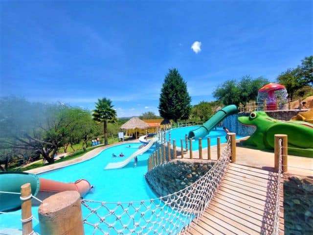 Two levels of the Xote waterpark in San Miguel de Allende with kids.