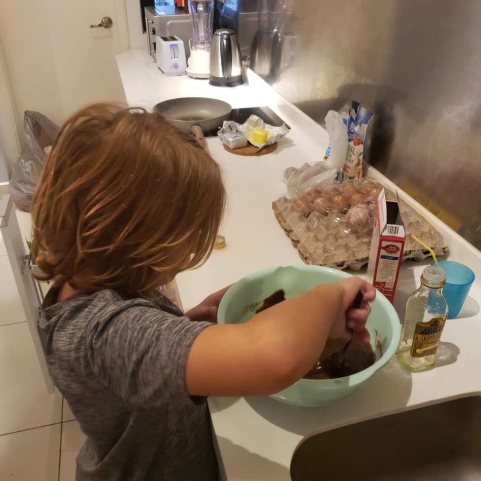 Worldschooling can be spontaneous hands-on experiences, like baking lockdown brownies.