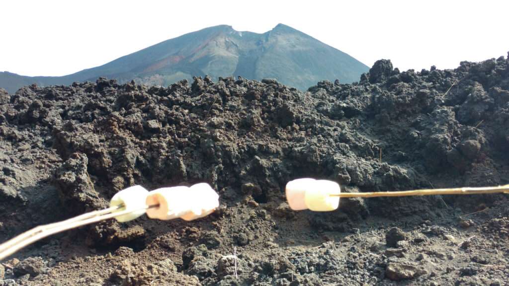 roasting marshmallows on a volcano is one of the funnest day trips from antigua guatemala.