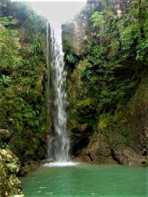 A waterfall flowing in EL Salvador. Slightly blurry.