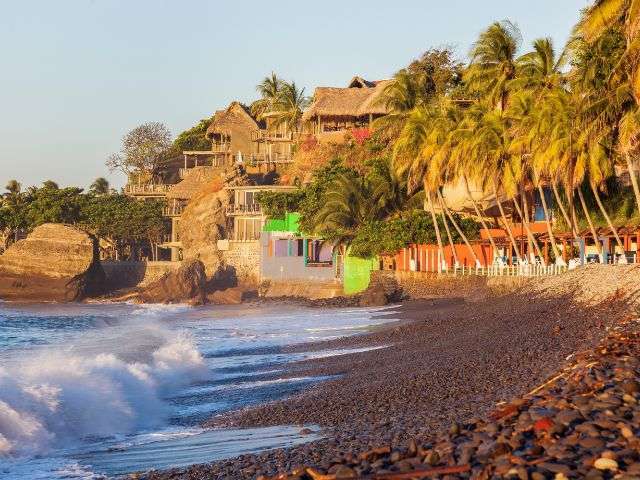 Have dinner in El Tunco, El Salvador at a beachfront restaurant.
