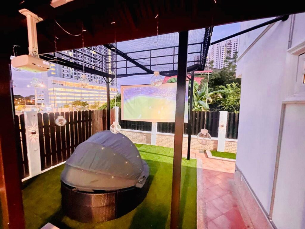 Backyard cinema area at Trendy Pool Villa