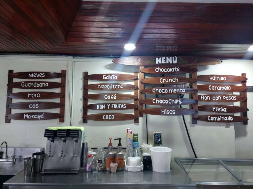 Ice cream flavor list on the wall at the Monteverde Cheese Factory