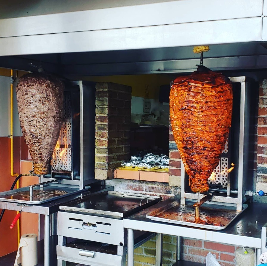 Meat cooking at El Fogon Restaurant in Playa del Carmen.