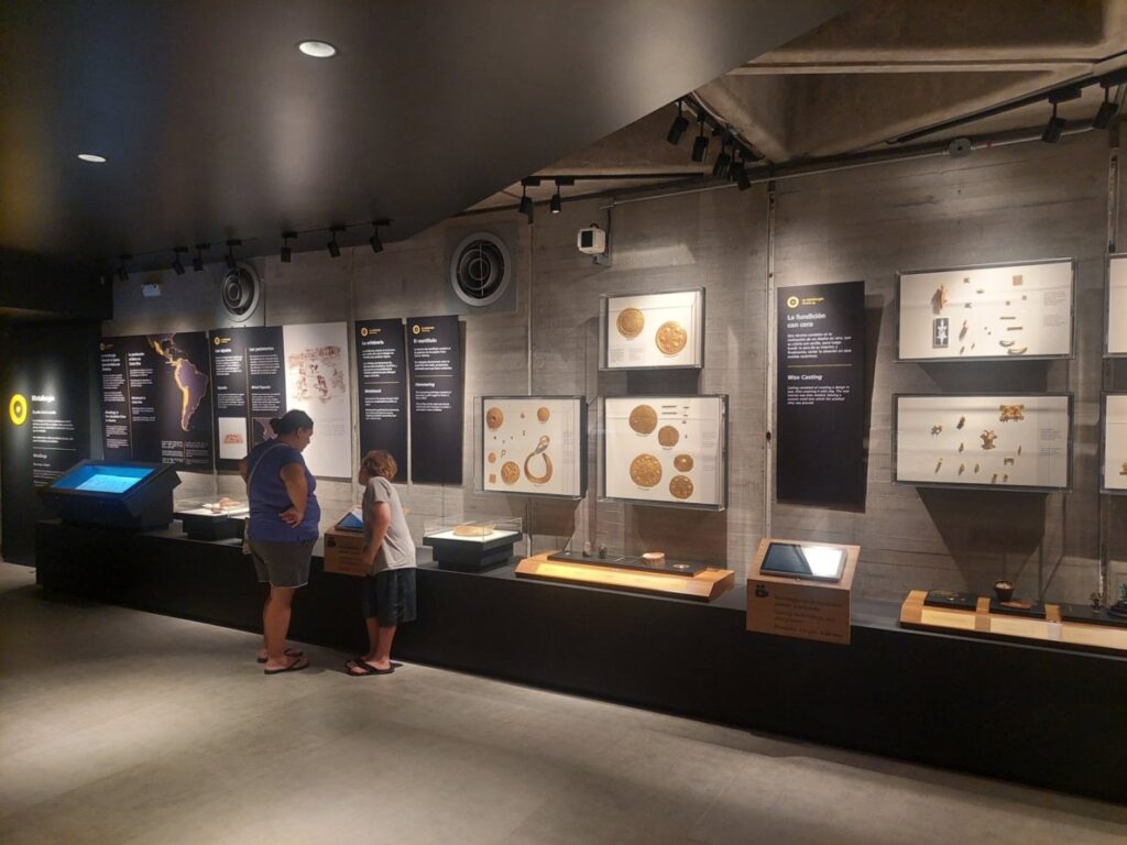 Brodi and Little Man looking at displays in the San Jose Costa Rica Gold Museum.