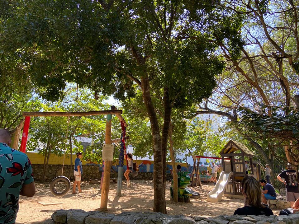 Playground at Parque la Ceiba in Playa del Carmen with kids.