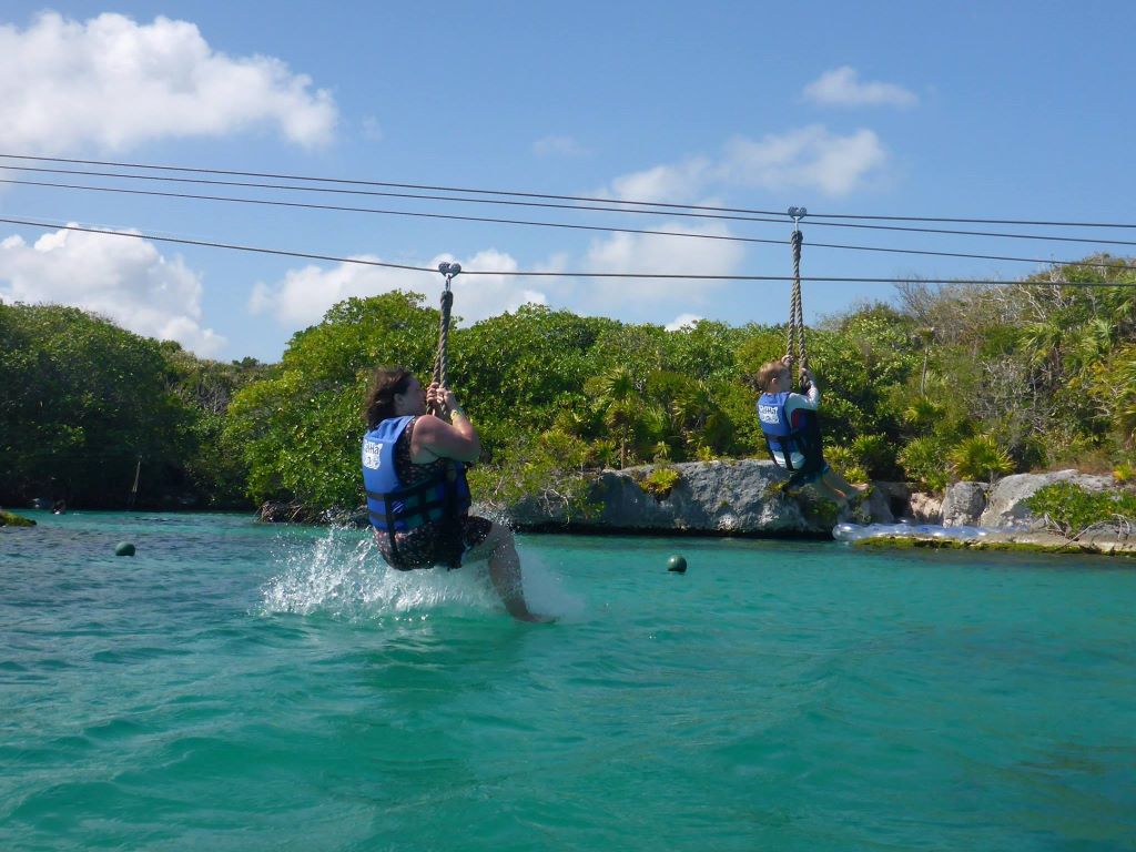 Ziplining into the water at Xel Ha water park in Playa del Carmen