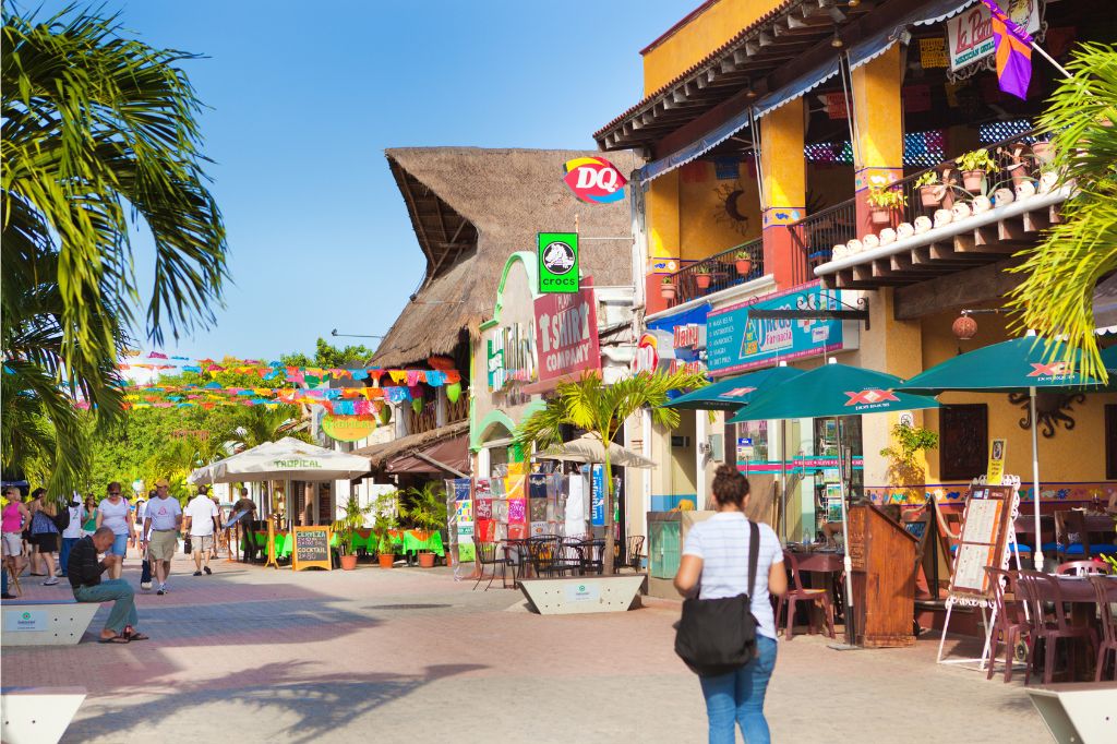 People walking on Quinta Avenida in Playa del Carmen.