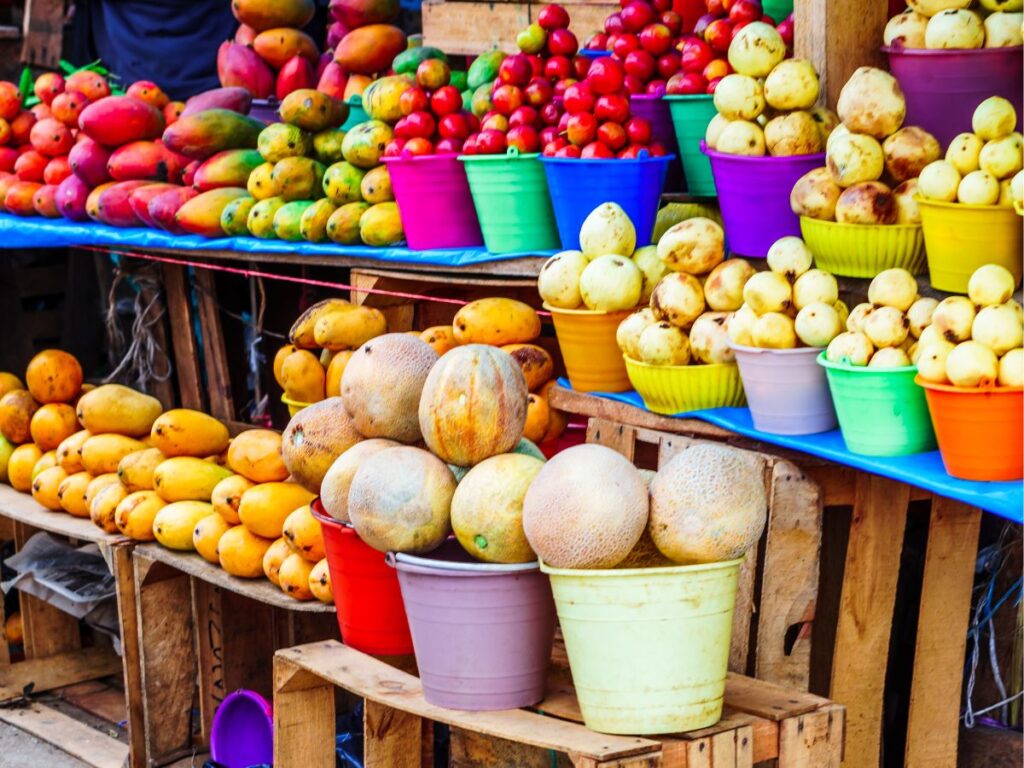 fruit market in mexico with mangoes and other fruit