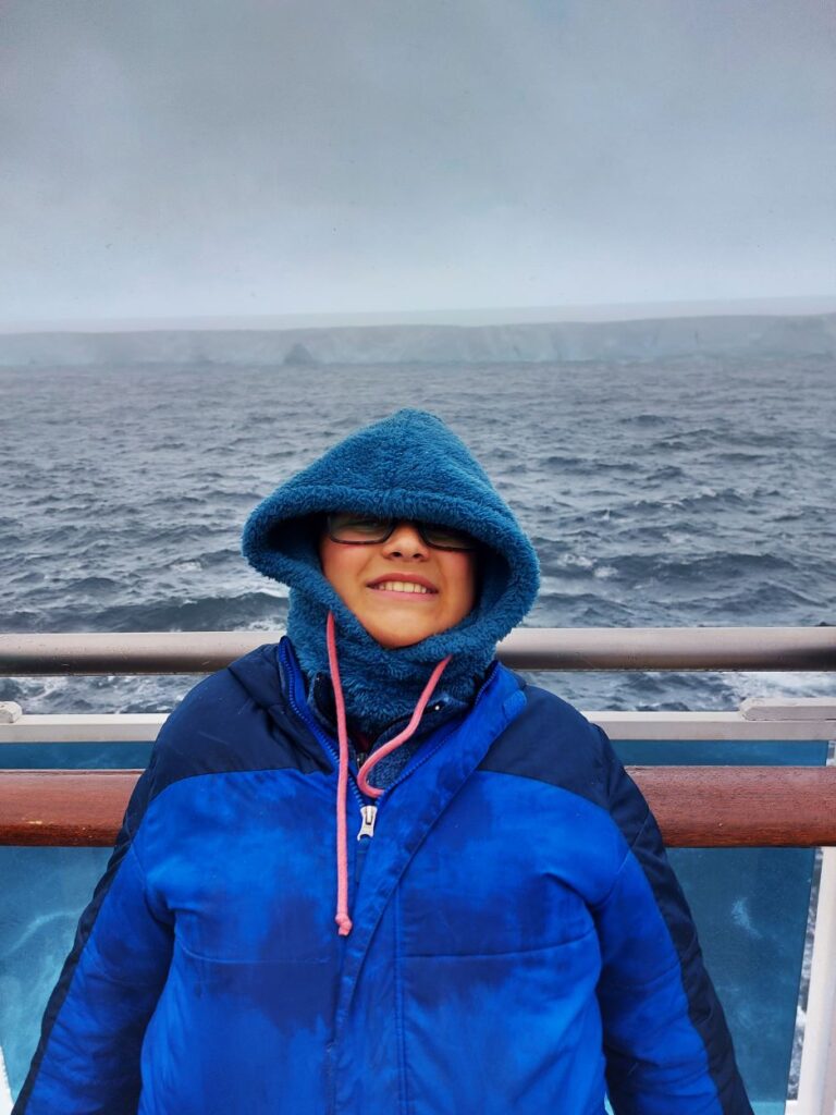 Little Man with Iceberg A23a. He was one of the first kids EVER to see it!