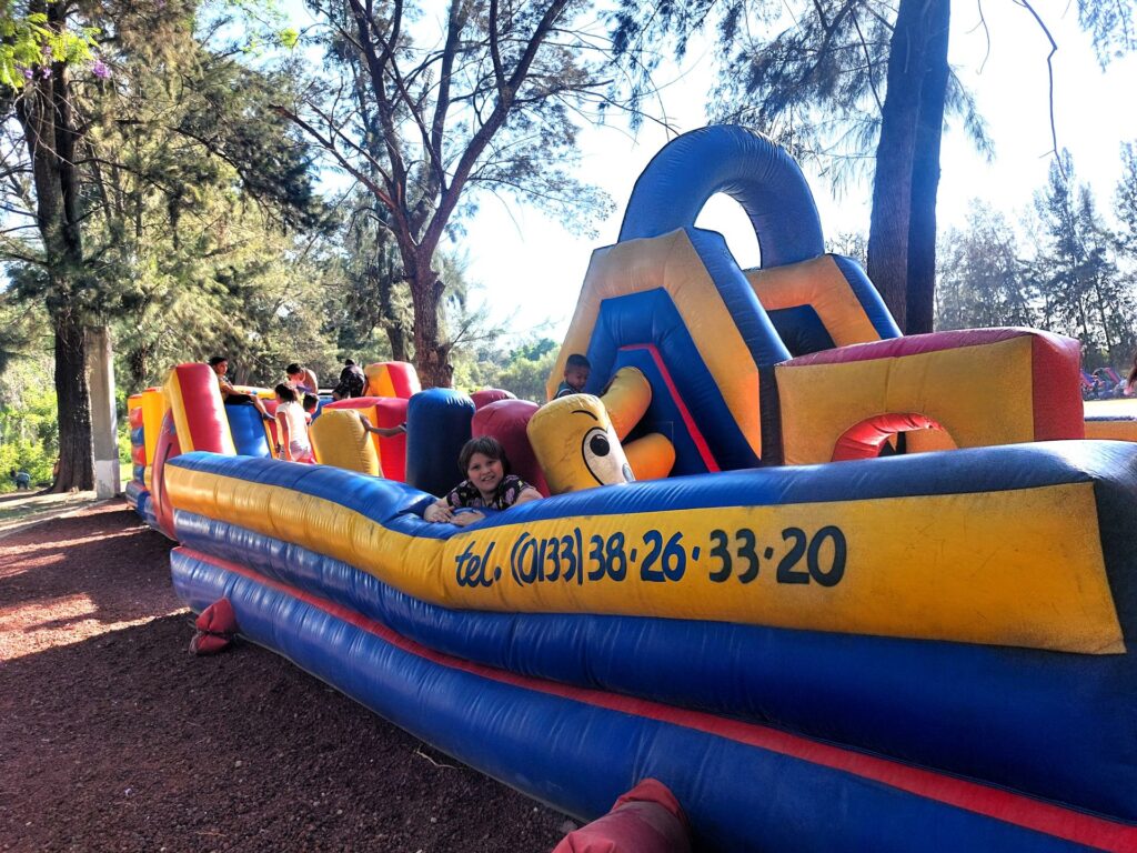 Little Man on an inflatable obstacle course in Mexico