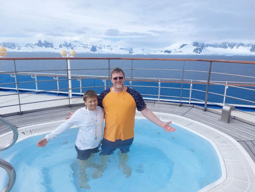 David and Little Man in a hot tub during the best Antarctica cruise we could have asked for.
