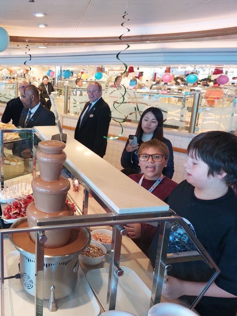 Little Man and a friend at the chocolate fountain buffet at lunch on New Year's Eve.