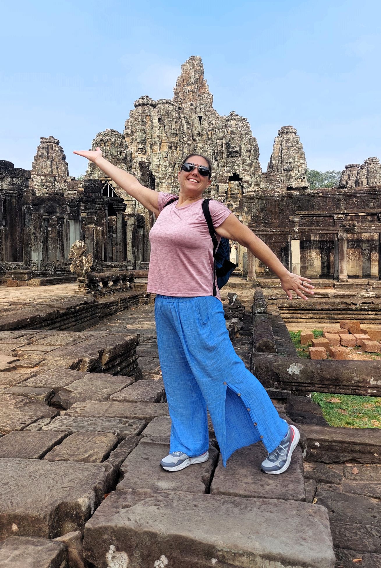Brodi standing in front of Bayon temple in Sieam Reap
