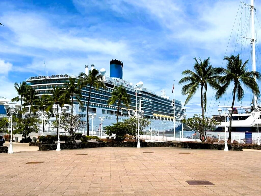 Carnival Luminosa cruise ship docked at port in Honolulu Hawaii