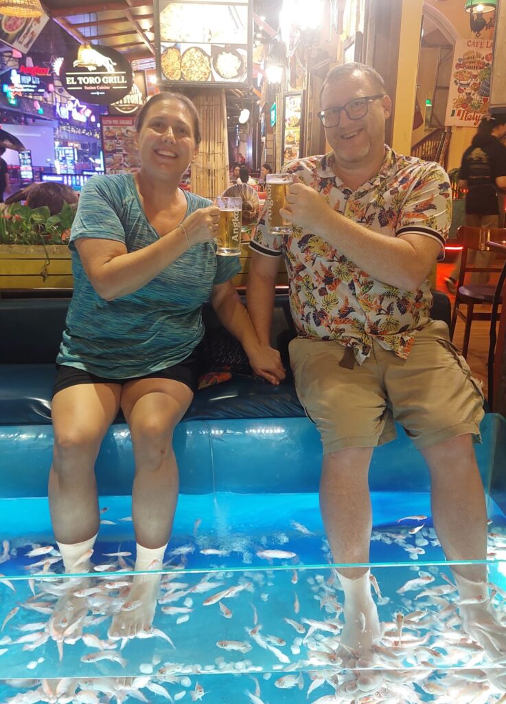 Brodi & David getting a fish pedicure in Siem Reap with kids