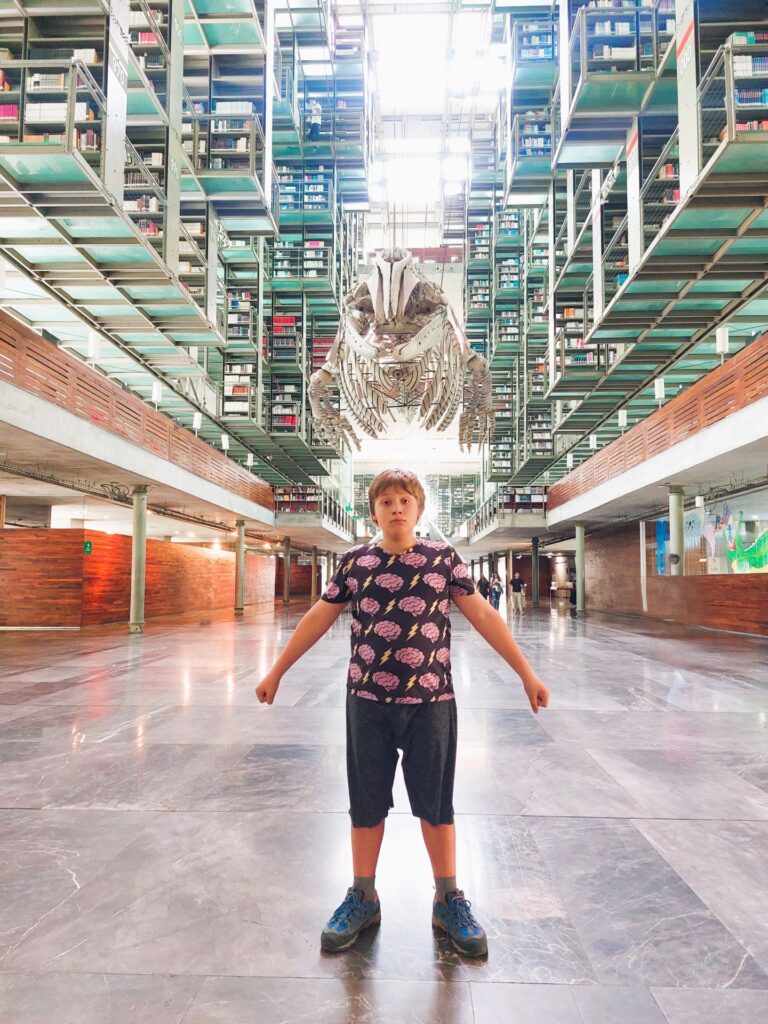 Little Man below the whale skeleton at Biblioteca Vasconcelos in Mexico City